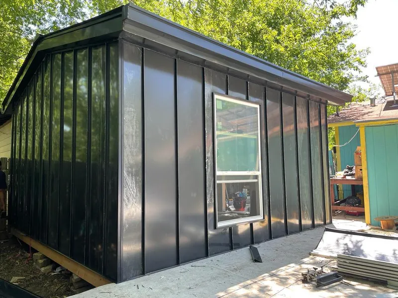 Black standing seam metal wall panels for Roof Inspection in Dormont